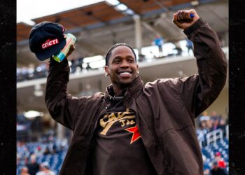 Travis Scott Throws First Pitch at Cacti Park for Astros Spring Coaching Opening Day